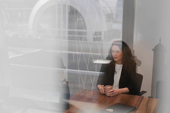 Two colleagues having a meeting in a meeting room