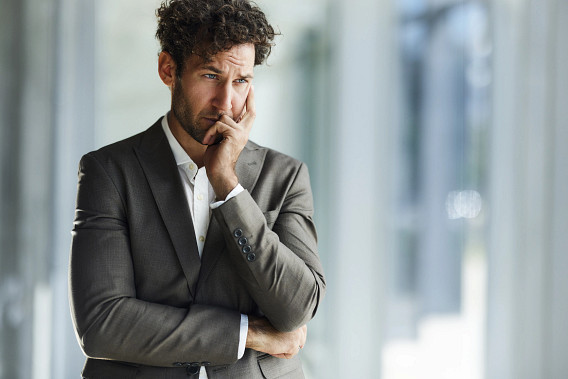 Worried male entrepreneur in the office.